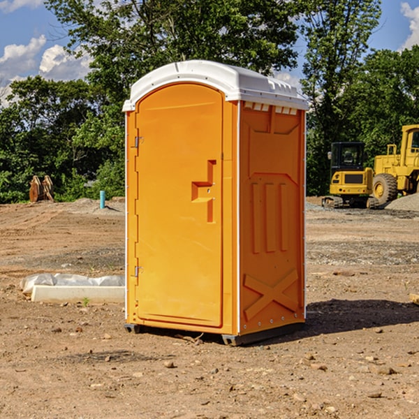 how often are the porta potties cleaned and serviced during a rental period in McDowell